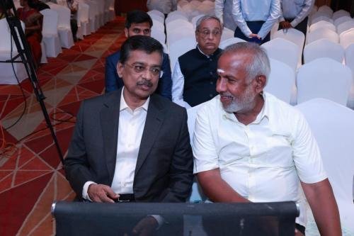 Chairman-Mr.Nataraj-interacts-Mr.Athul-Asher-Behind